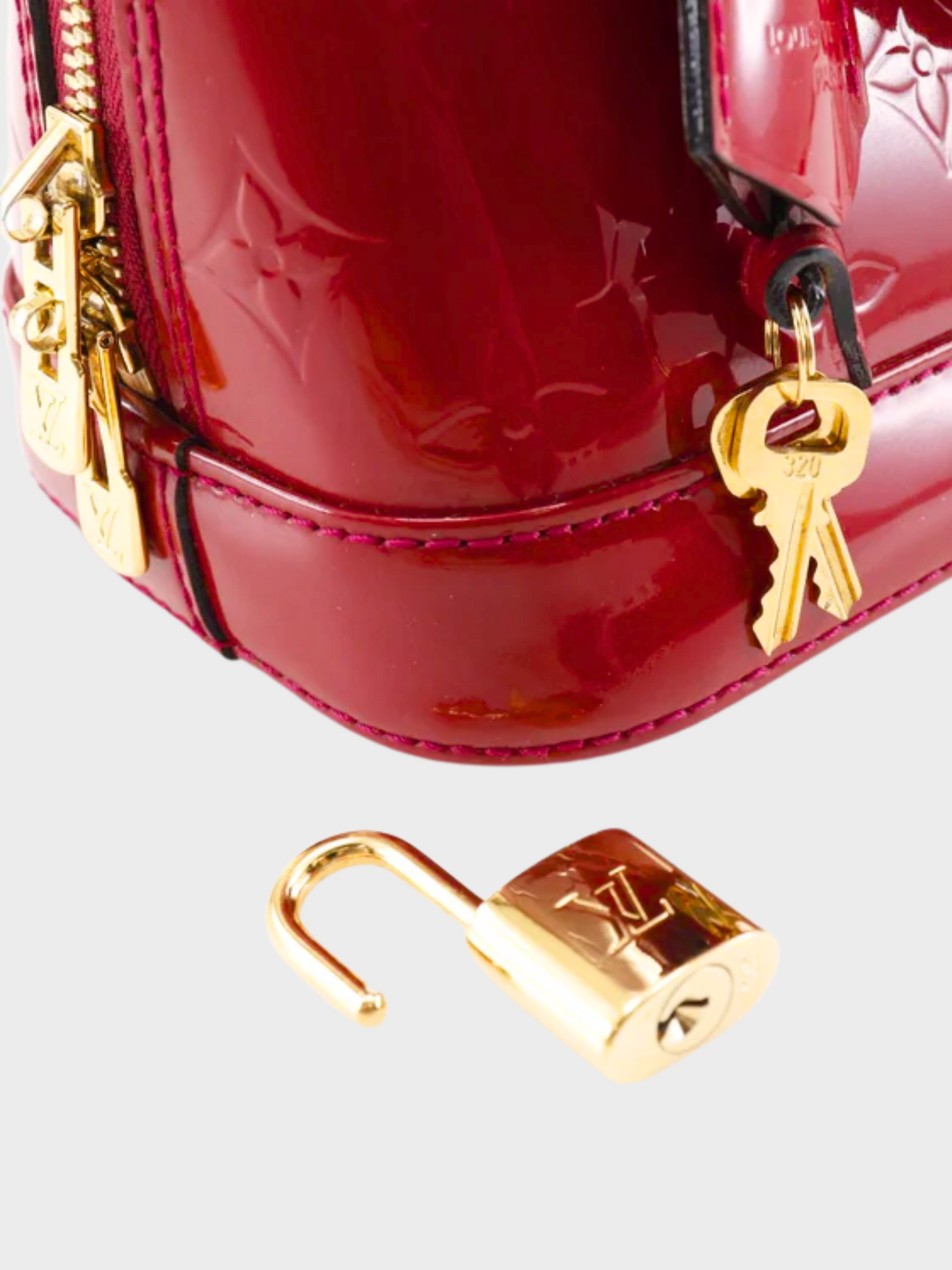 Louis Vuitton 2014 Red Alma Monogram Handbag