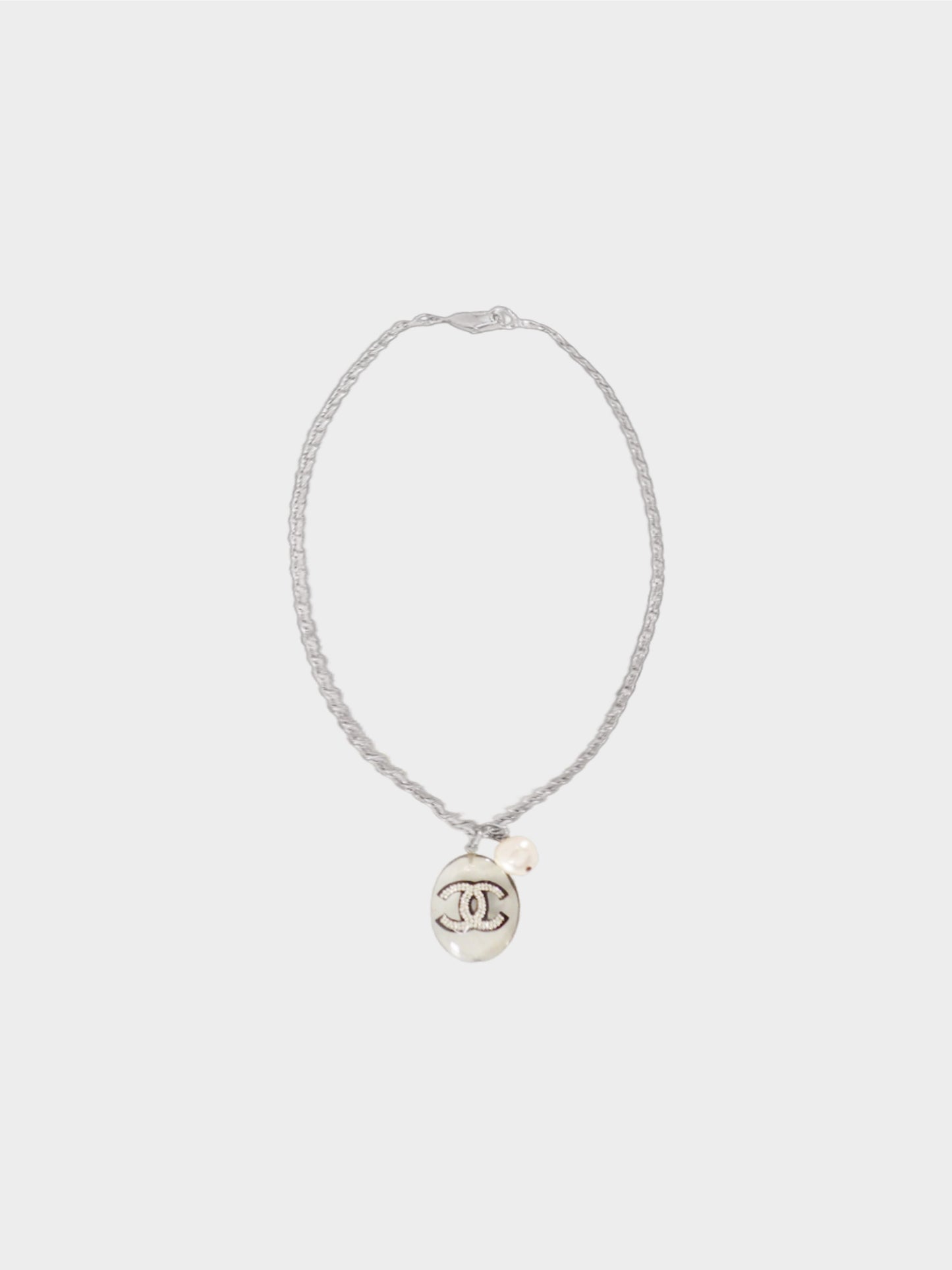 Chanel Fall 2004 Clear Oval CC Resin and Faux Pearl Pendant Necklace
