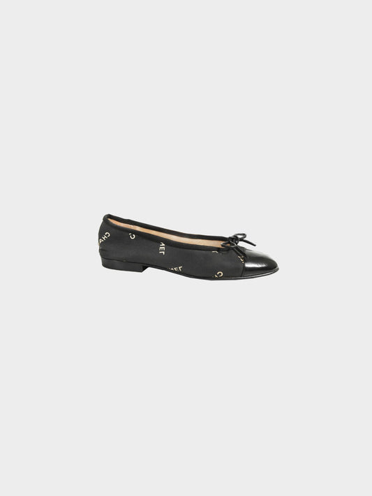 Chanel 2000s Black Canvas and Leather Logo Print Ballet Flats