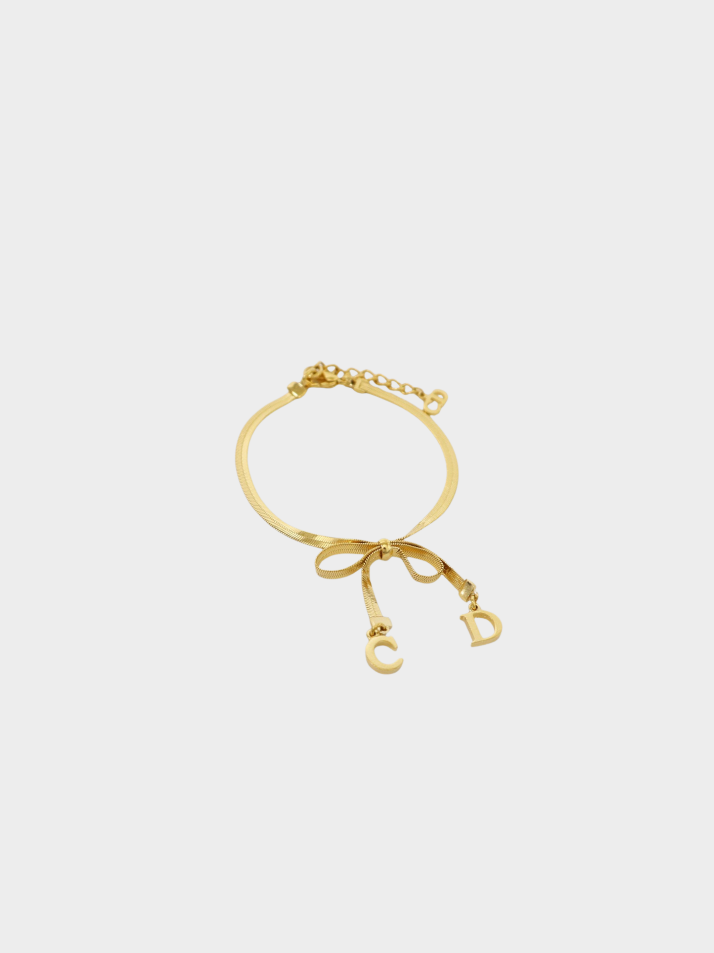 Christian Dior 2000s Gold Plated Metal CD Ribbon Bracelet