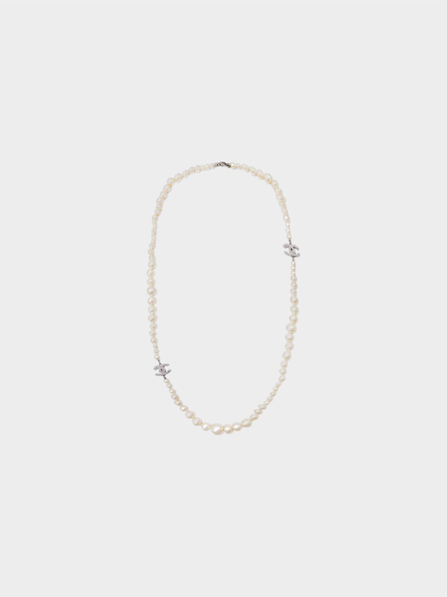 Chanel 2009 Long Pearl CC Necklace