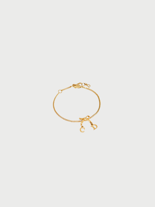 Christian Dior 2020s Gold Plated Metal CD Ribbon Bracelet