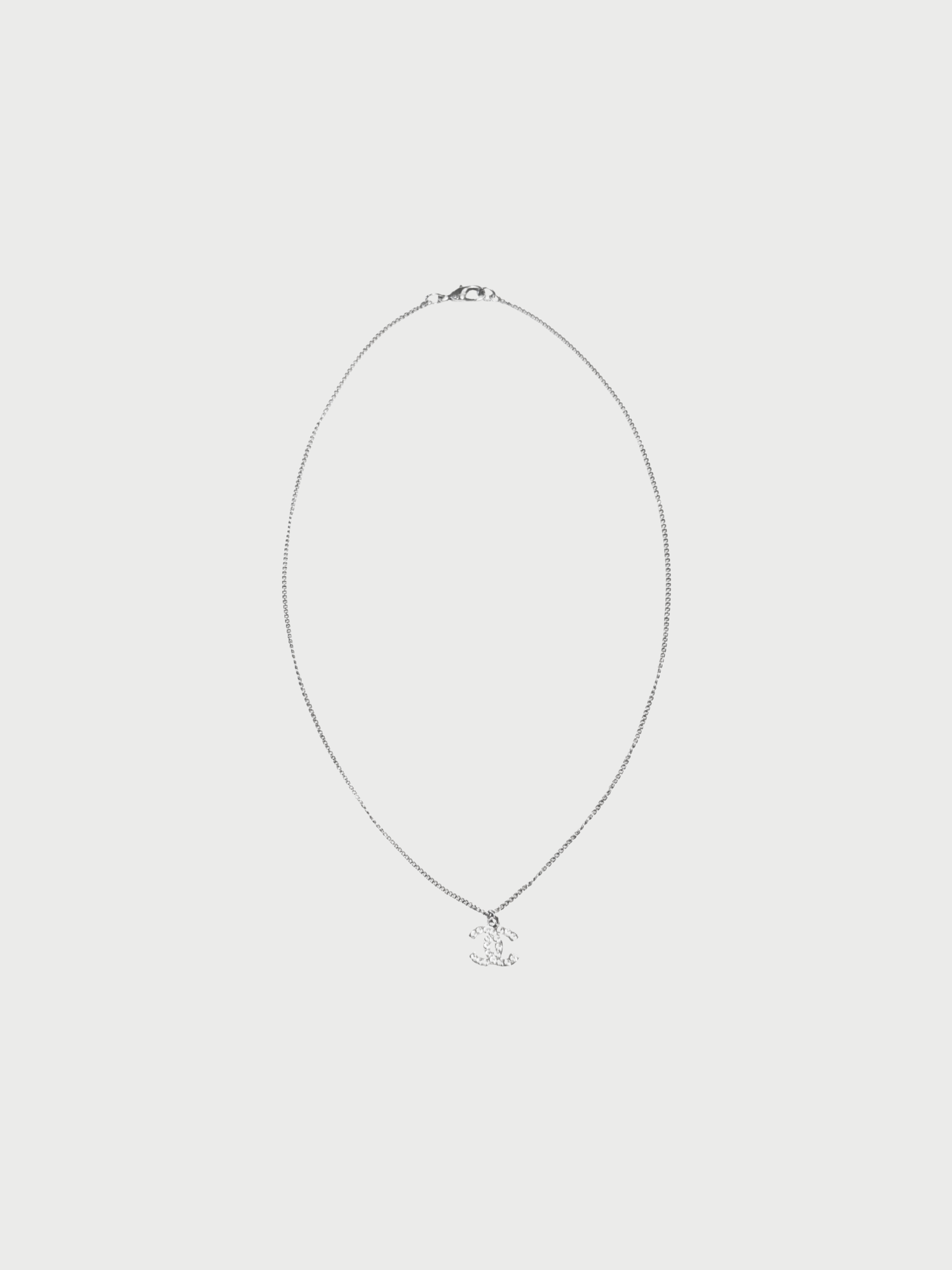 Chanel 2000s Silver Crystal Mini CC Pendant Necklace
