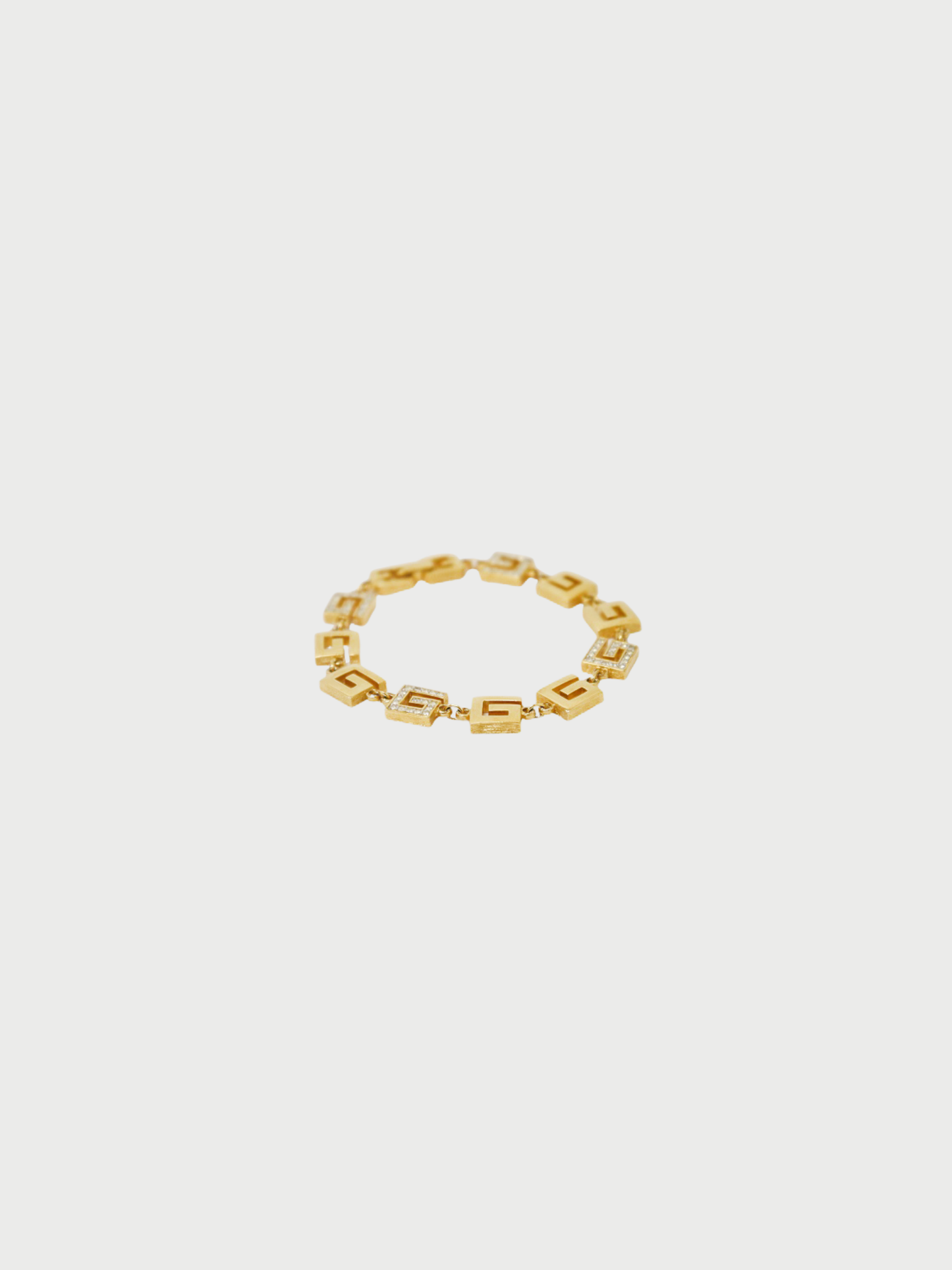 Givenchy 2000s Gold Plated Metal Rhinestone Accents G Bracelet