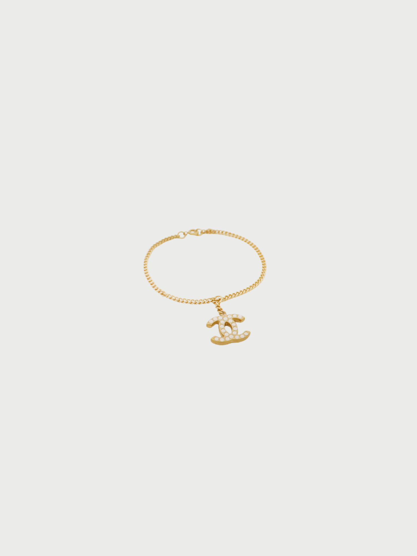 Chanel 2000s Gold White Plated Metal Rhinestone COCO Logo Bracelet