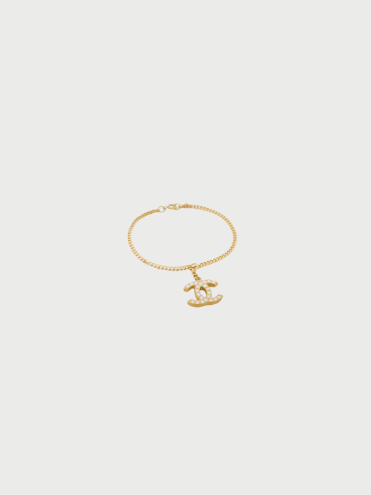 Chanel 2000s Gold White Plated Metal Rhinestone COCO Logo Bracelet