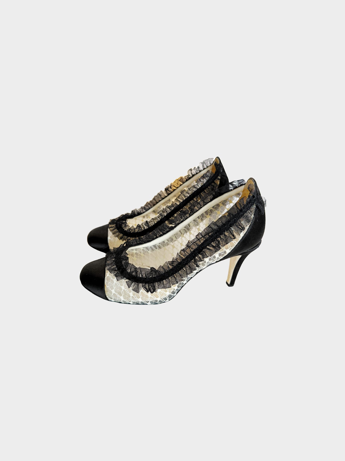 Chanel 2012 Ivory and Black Ruffled Lace Pumps