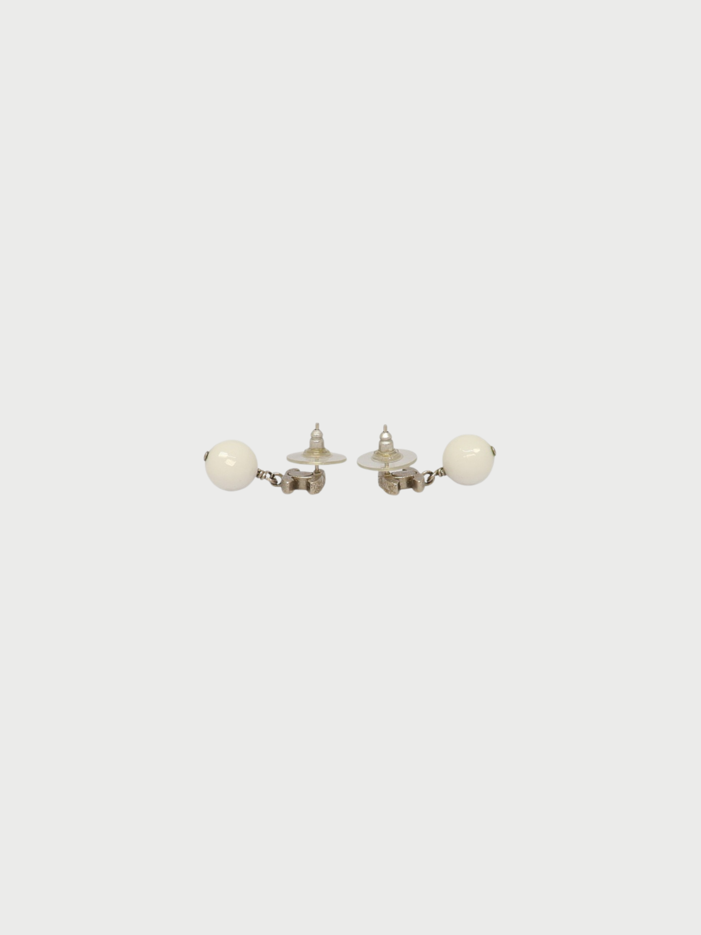 Chanel 2000s Silver White Plated Metal COCO Swing Earrings