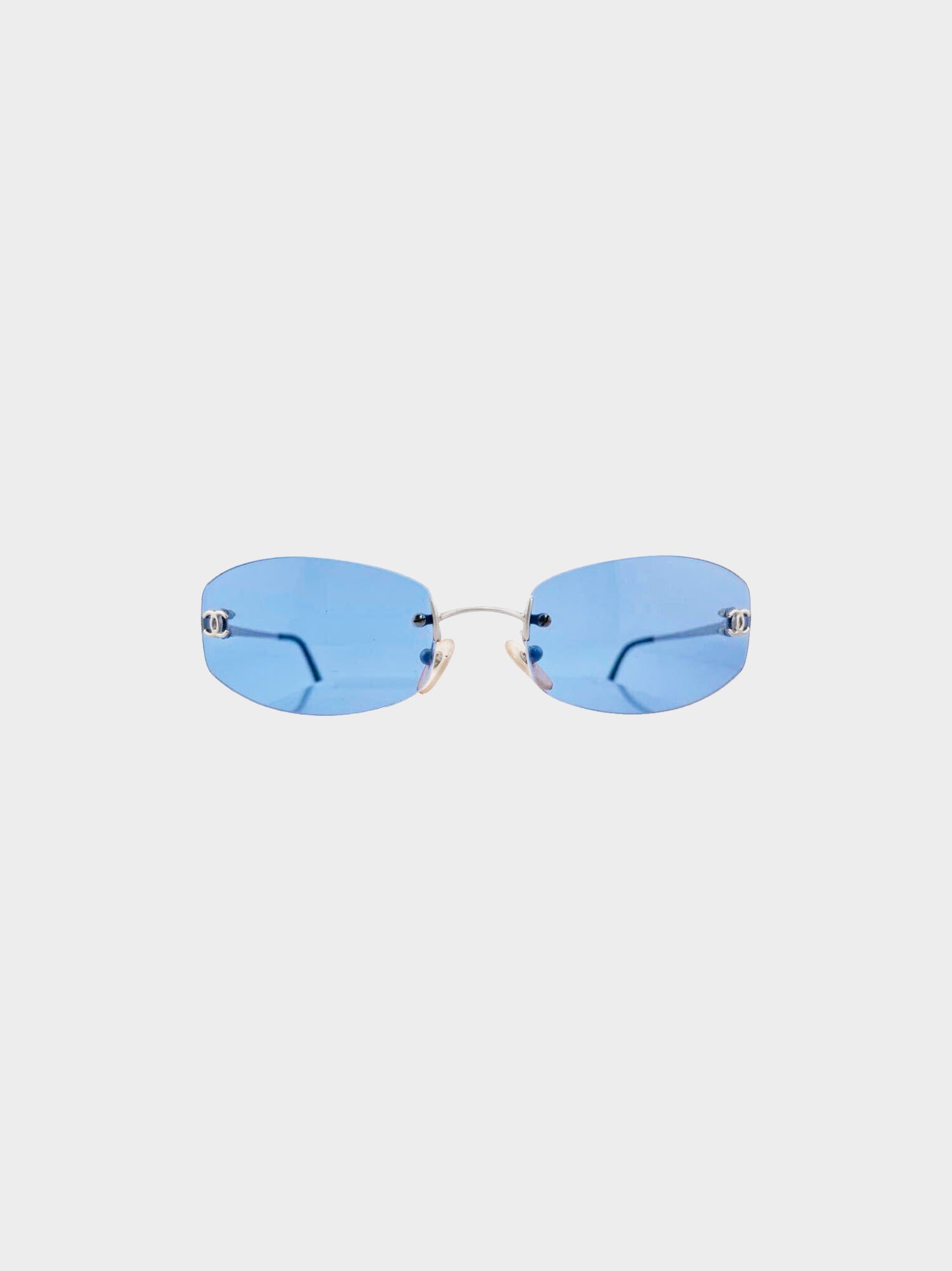 Chanel by Karl Lagerfeld 2000s Blue Tinted CC Logo Embellished Rimless Sunglasses
