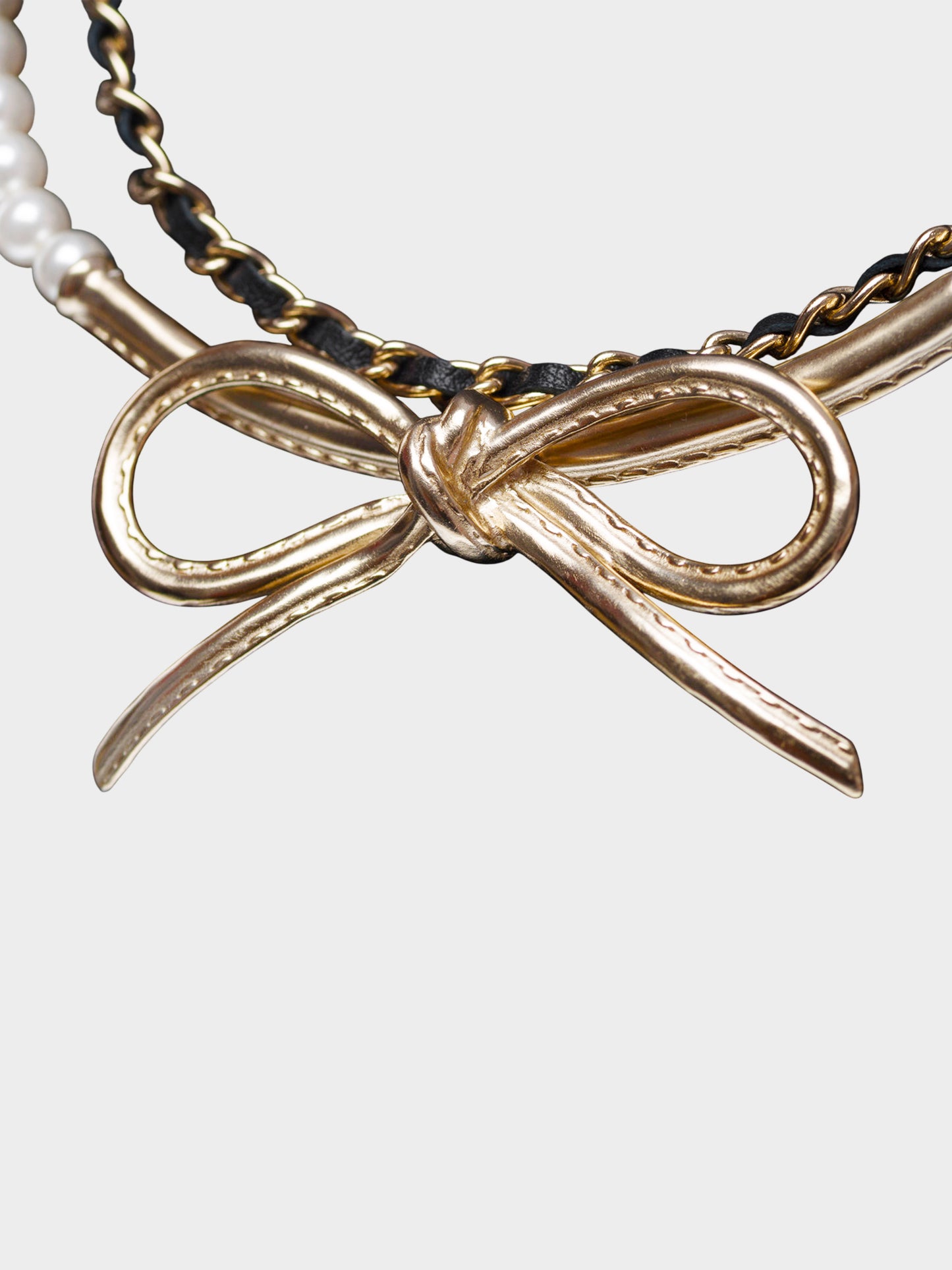 Chanel 2022 Faux Pearl and Leather-woven Chain Bow Necklace