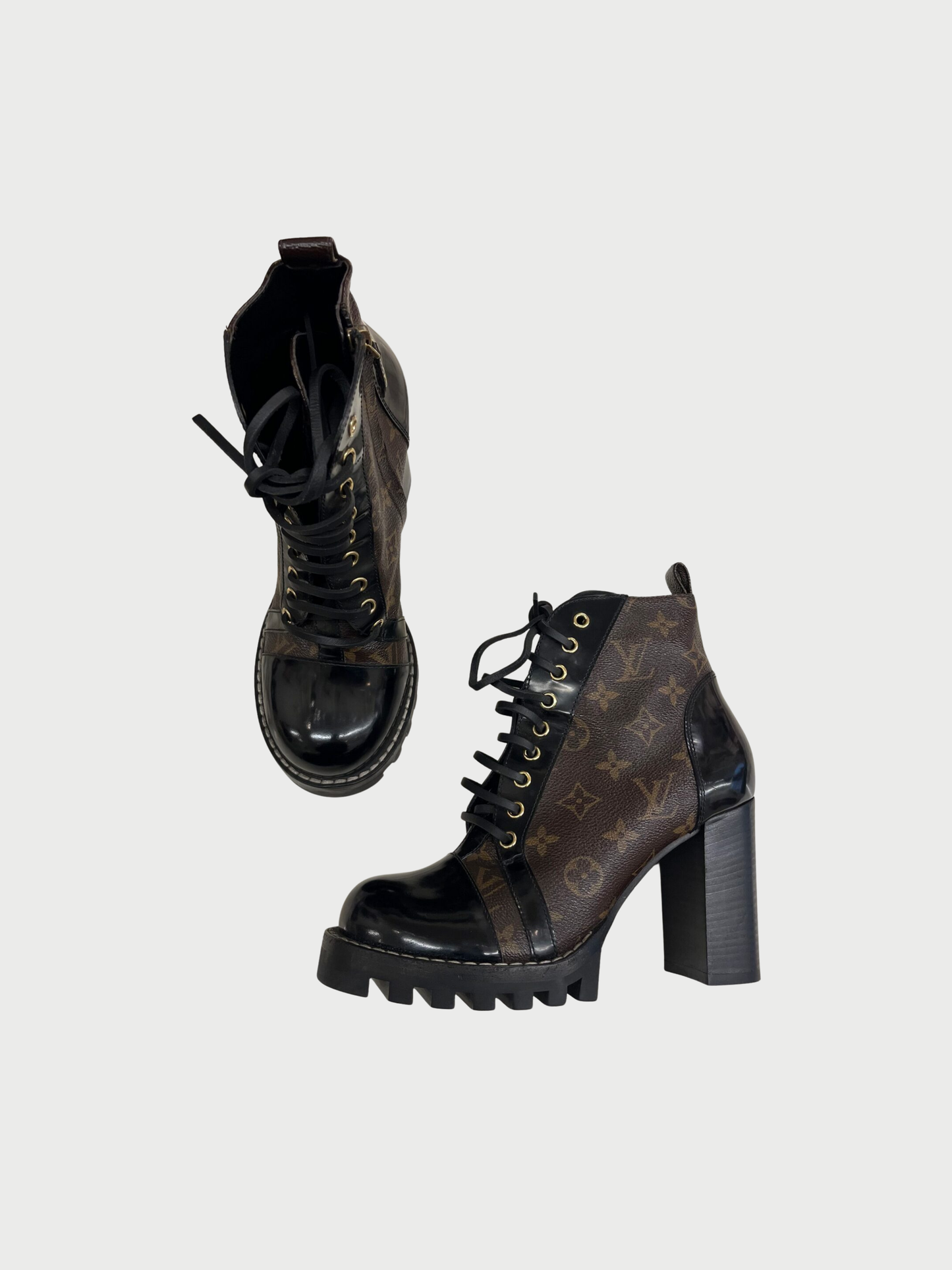 Louis Vuitton 2010s Brown Monogram Black Leather Star Trail Ankle Boots