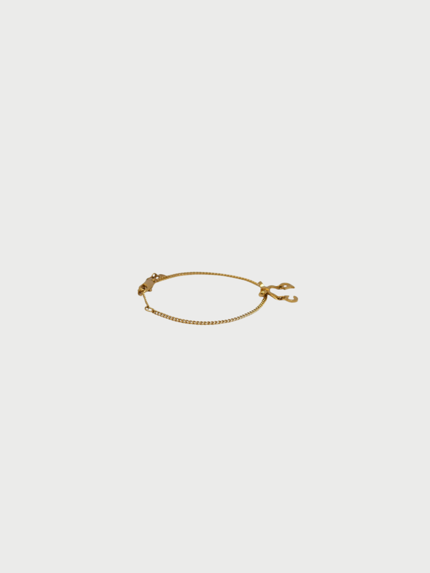 Christian Dior 2020s Gold Plated Metal CD Ribbon Bracelet