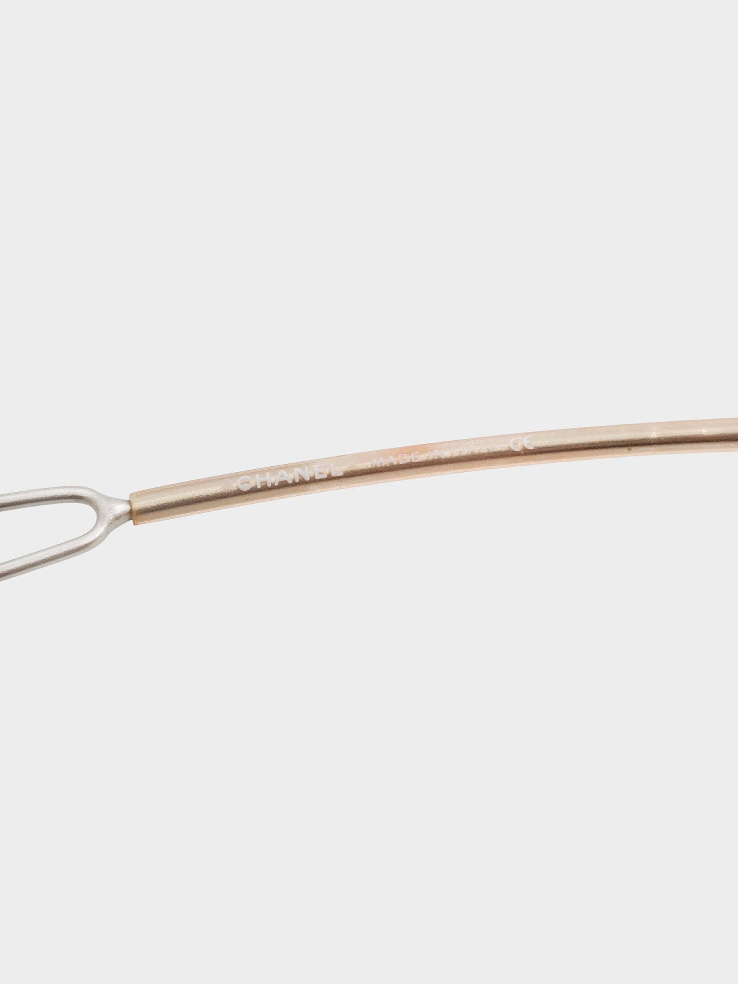 Chanel 2000s Silver Rimless CC and Cut-out Oval Sunglasses