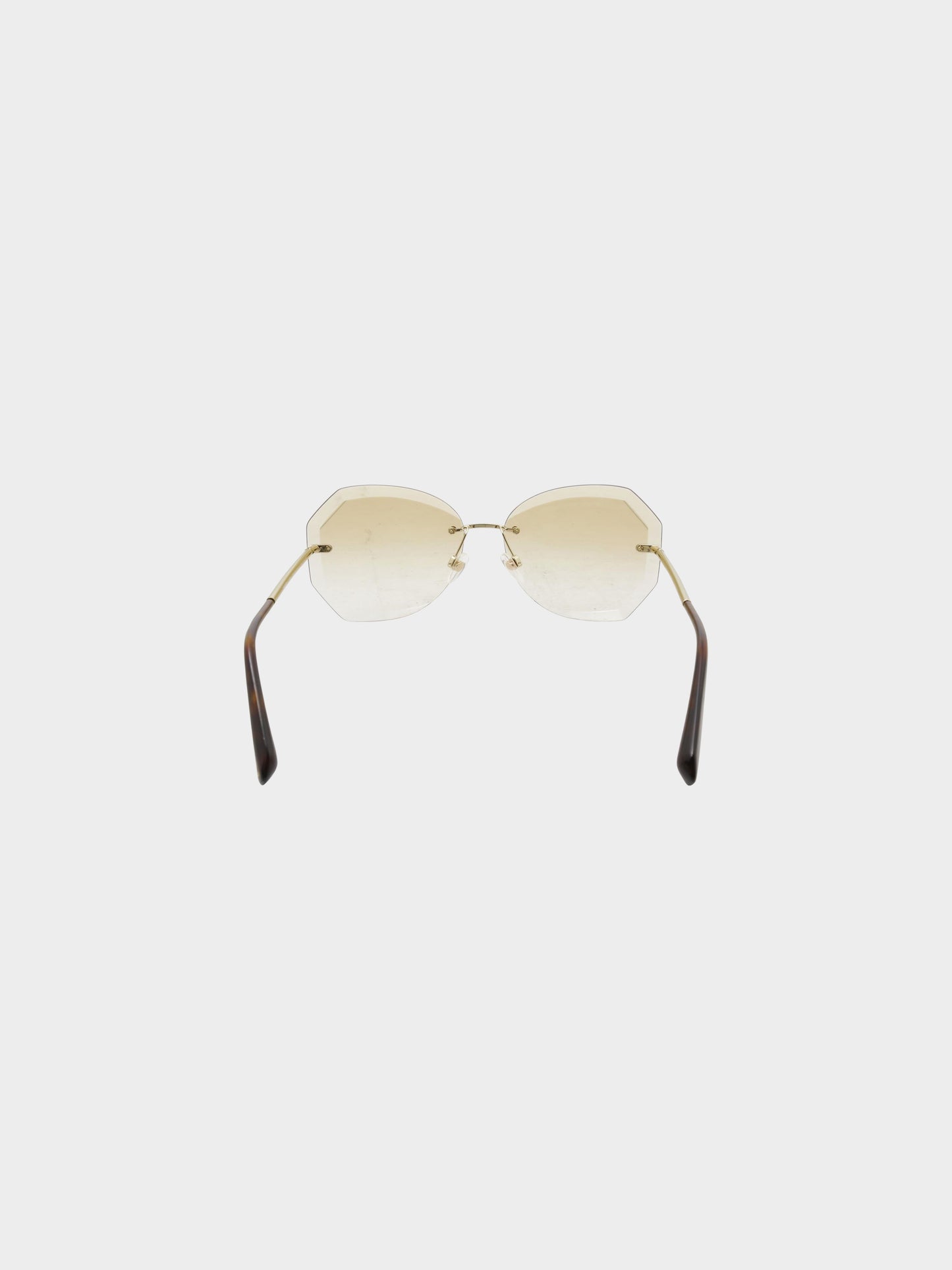 Chanel 2000s Brown Round Rimless Sunglasses