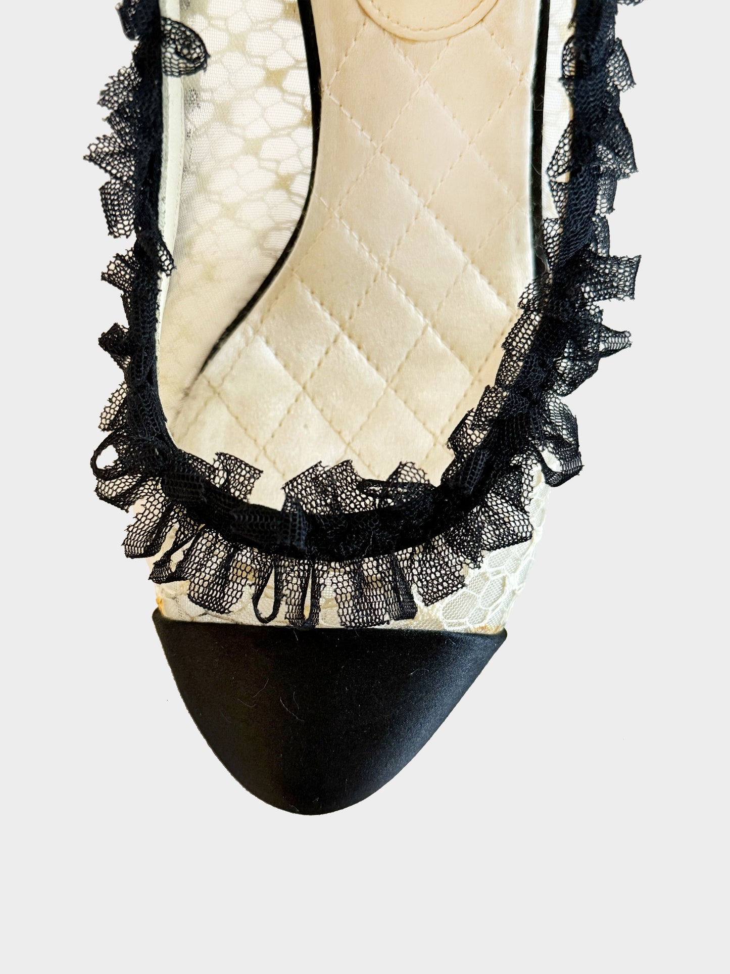Chanel 2012 Ivory and Black Ruffled Lace Pumps