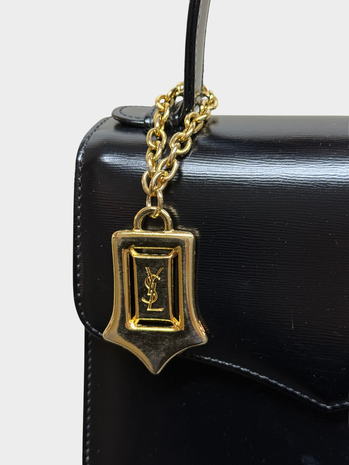 Yves Saint Laurent 1990s Black Leather Logo Charm 2-Way Handbag