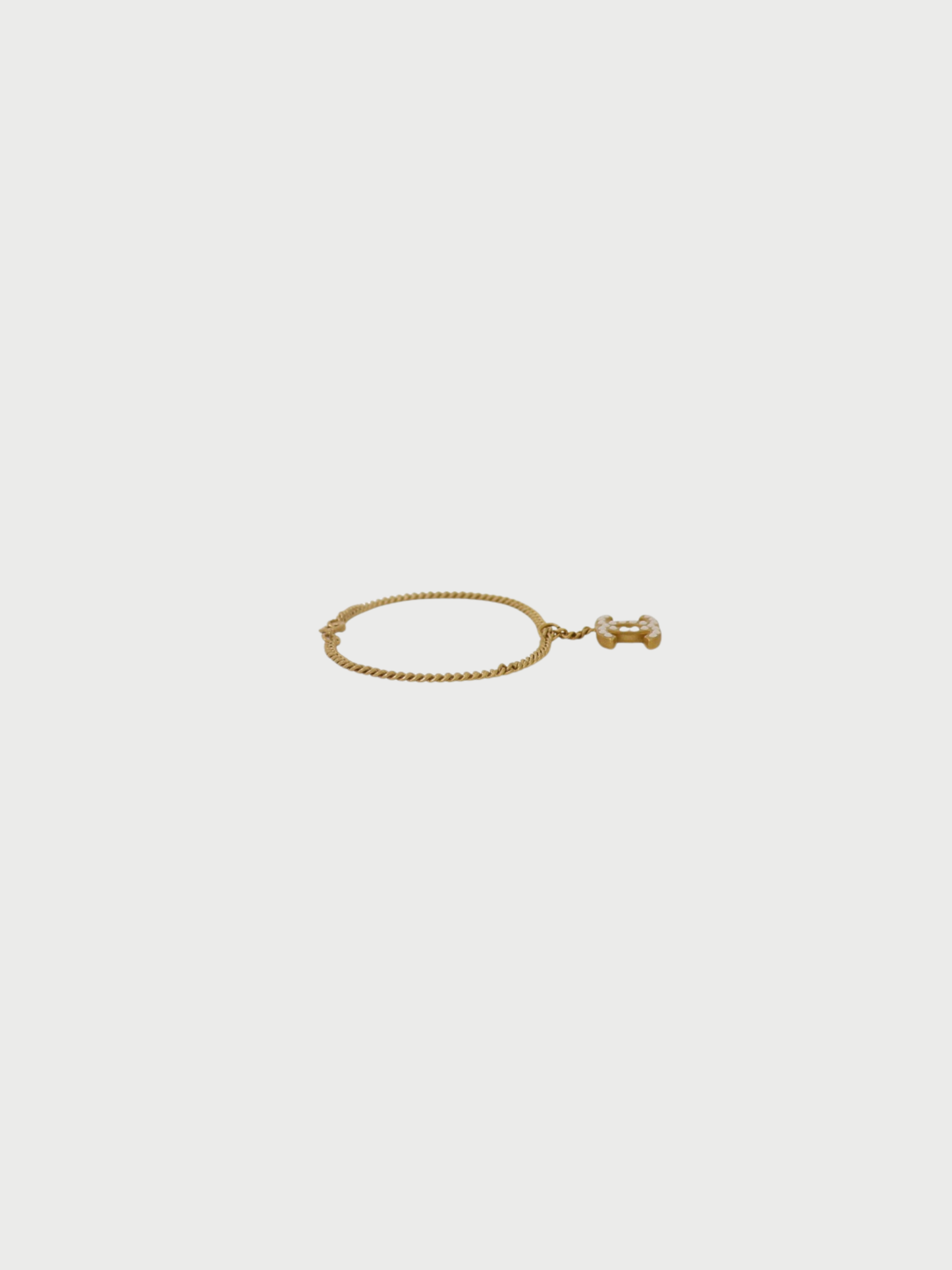 Chanel 2000s Gold White Plated Metal Rhinestone COCO Logo Bracelet