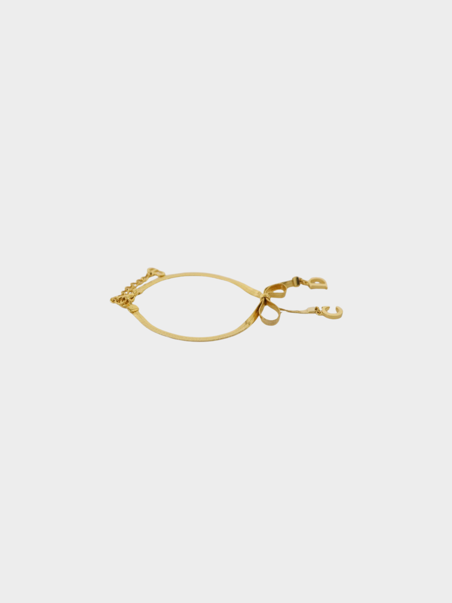 Christian Dior 2000s Gold Plated Metal CD Ribbon Bracelet