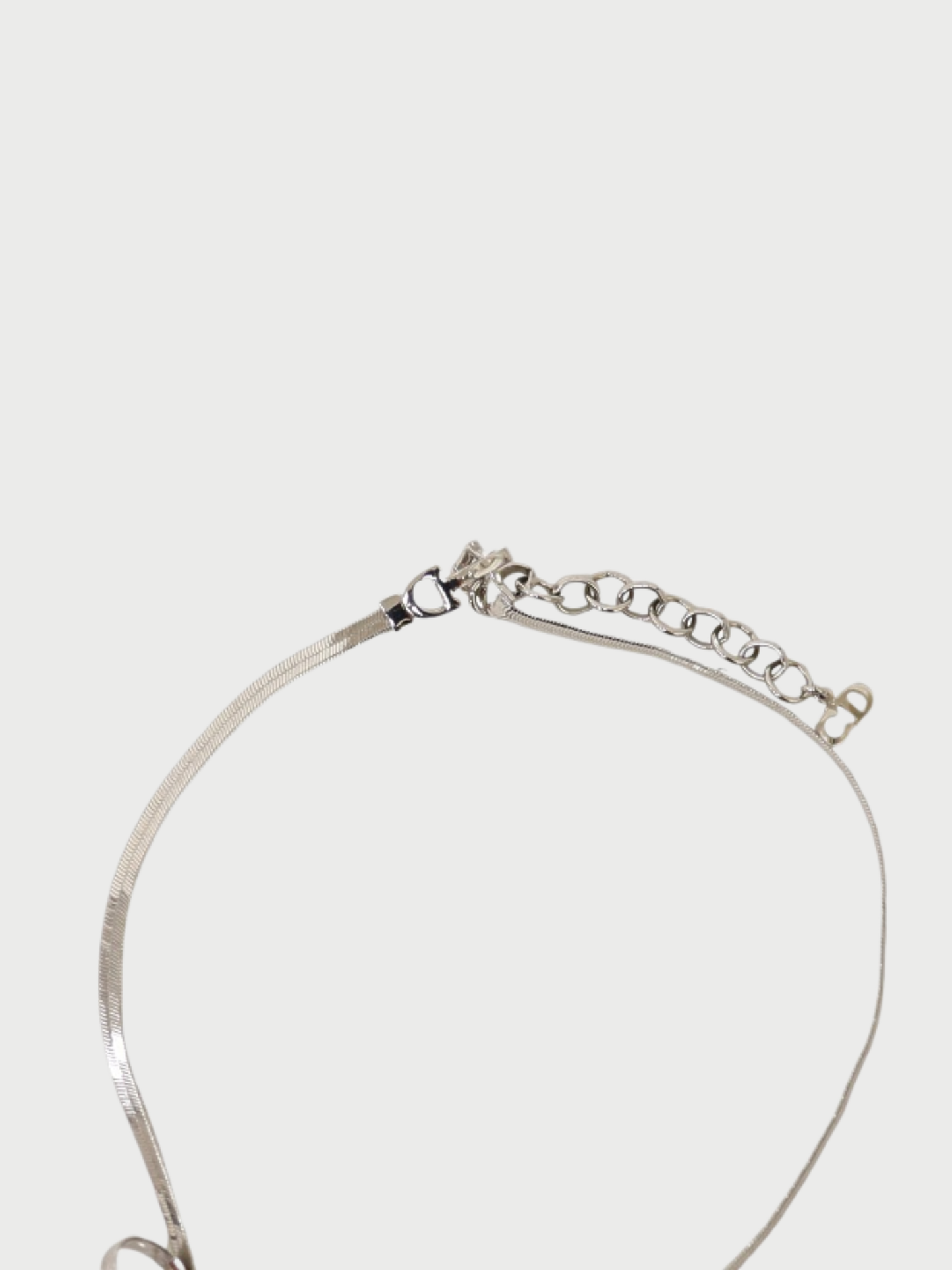Christian Dior 2000s Silver Plated Metal CD Ribbon Necklace