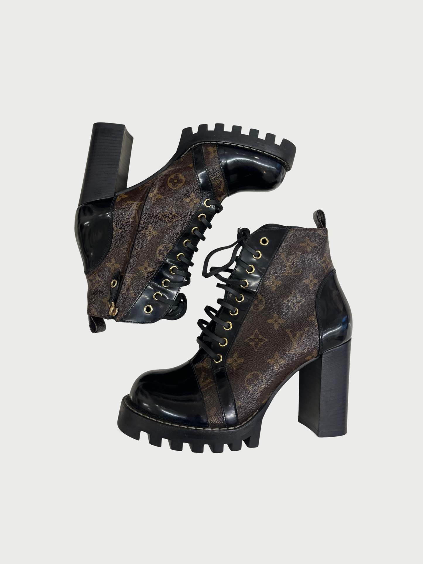 Louis Vuitton 2010s Brown Monogram Black Leather Star Trail Ankle Boots