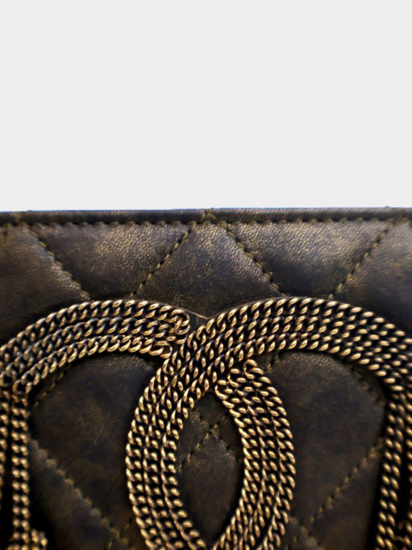 Chanel 2011 Black and Gold Lambskin CC Fringe Clutch
