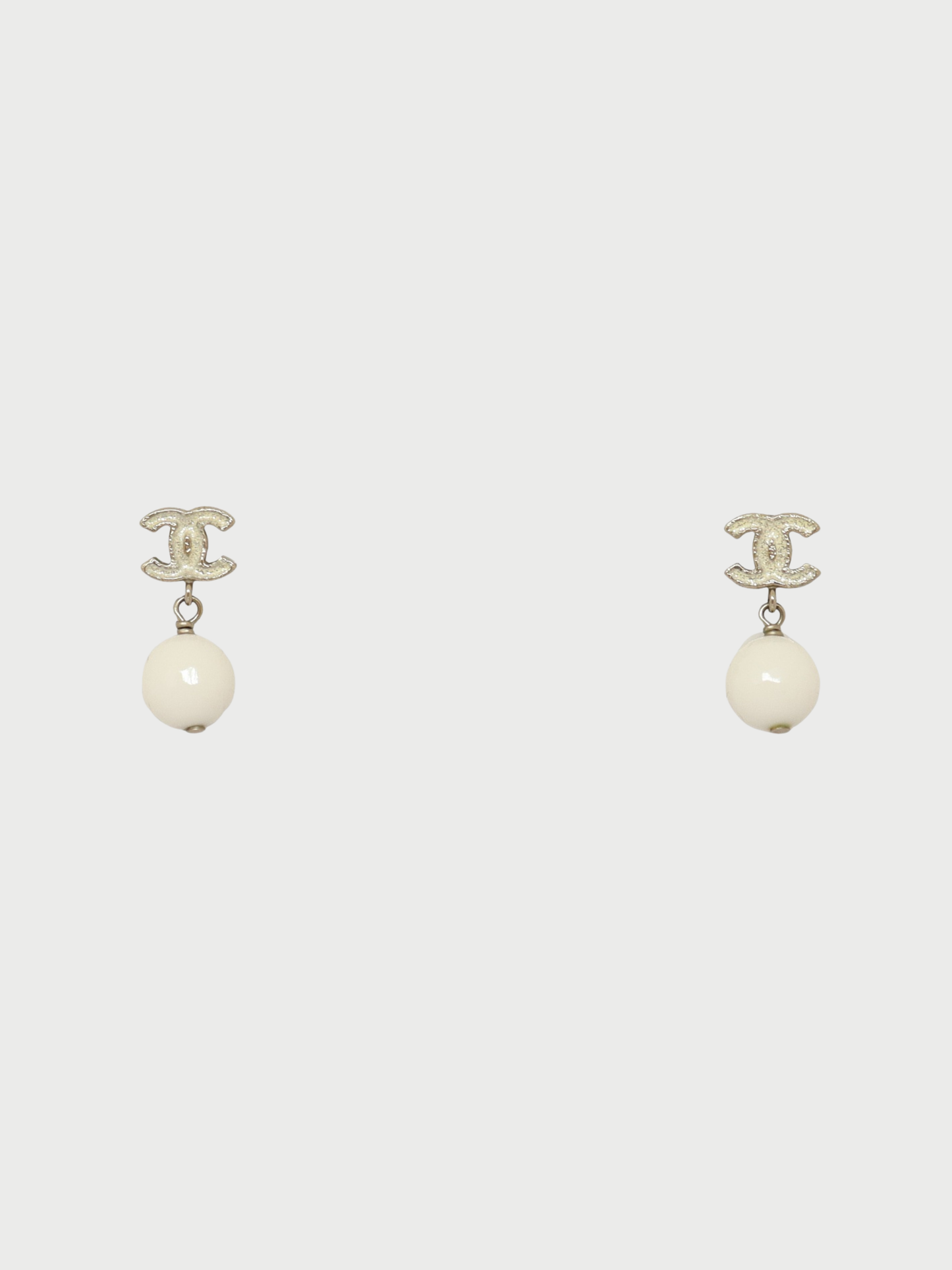 Chanel 2000s Silver White Plated Metal COCO Swing Earrings