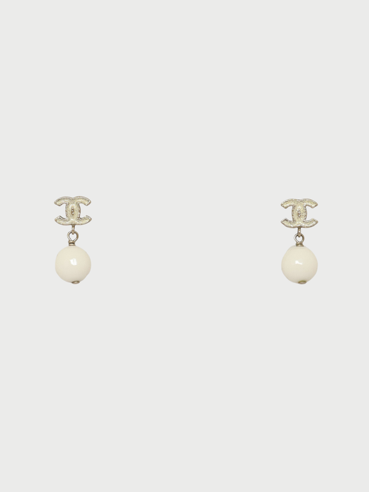 Chanel 2000s Silver White Plated Metal COCO Swing Earrings