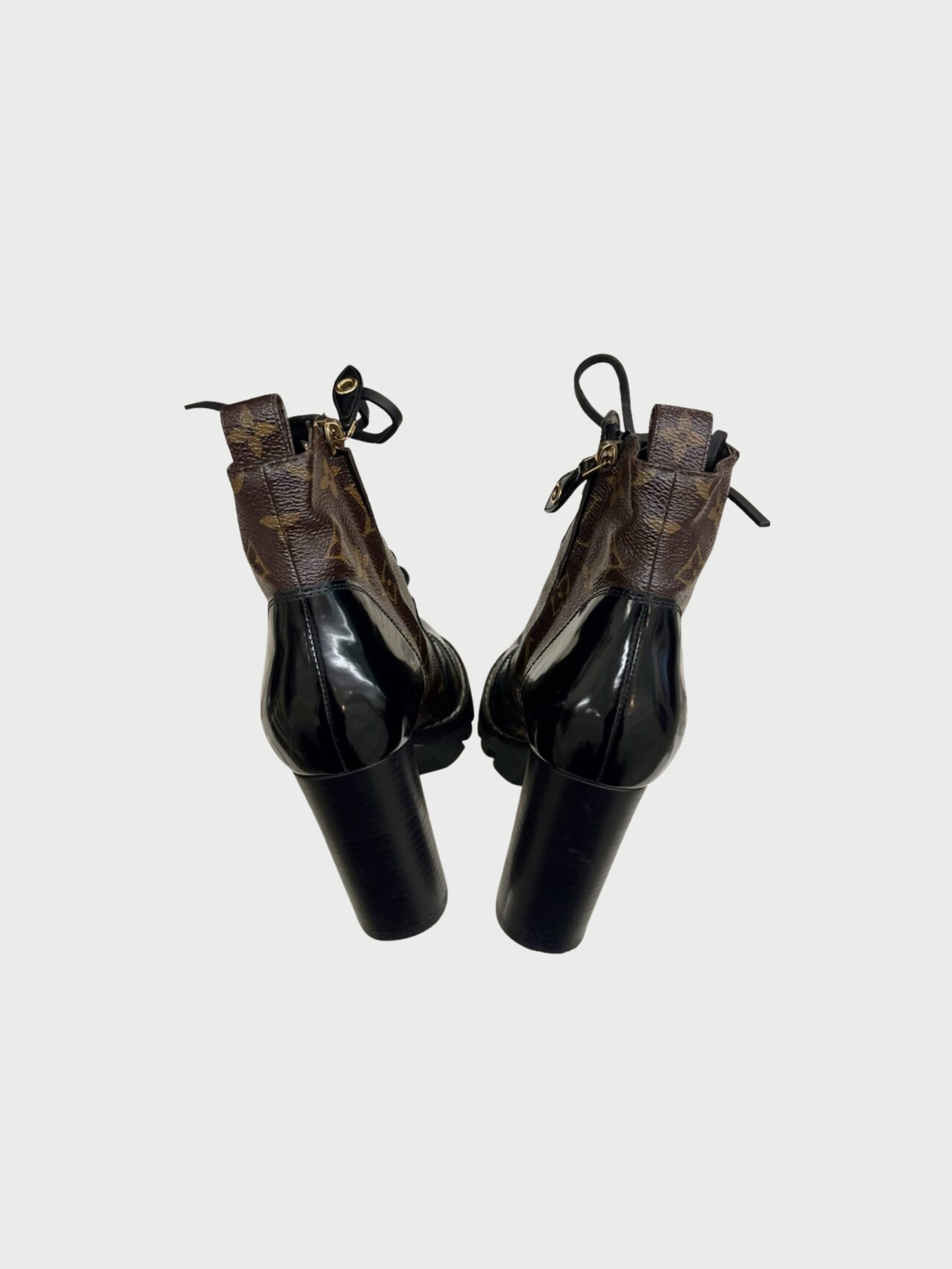 Louis Vuitton 2010s Brown Monogram Black Leather Star Trail Ankle Boots