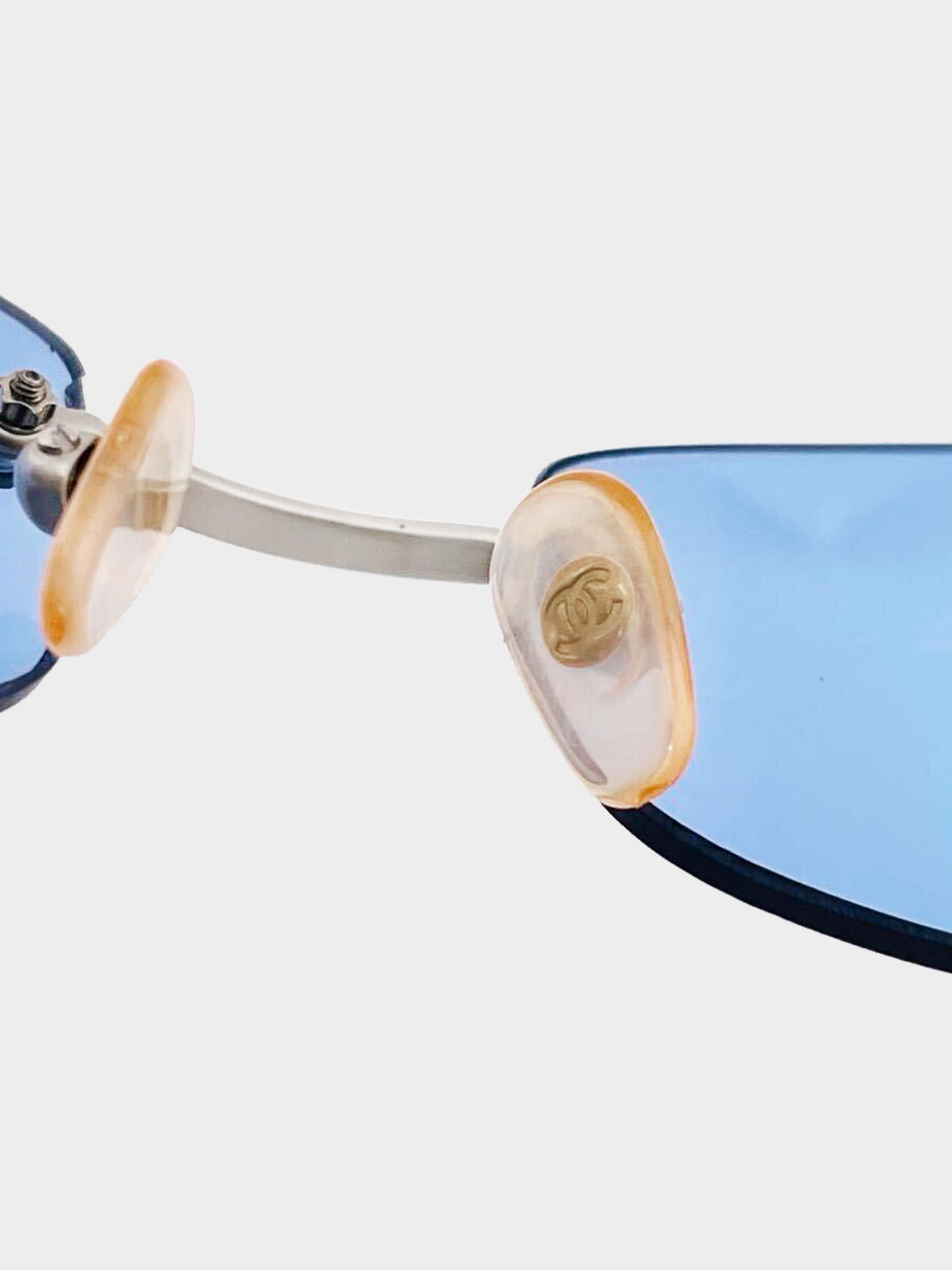 Chanel by Karl Lagerfeld 2000s Blue Tinted CC Logo Embellished Rimless Sunglasses