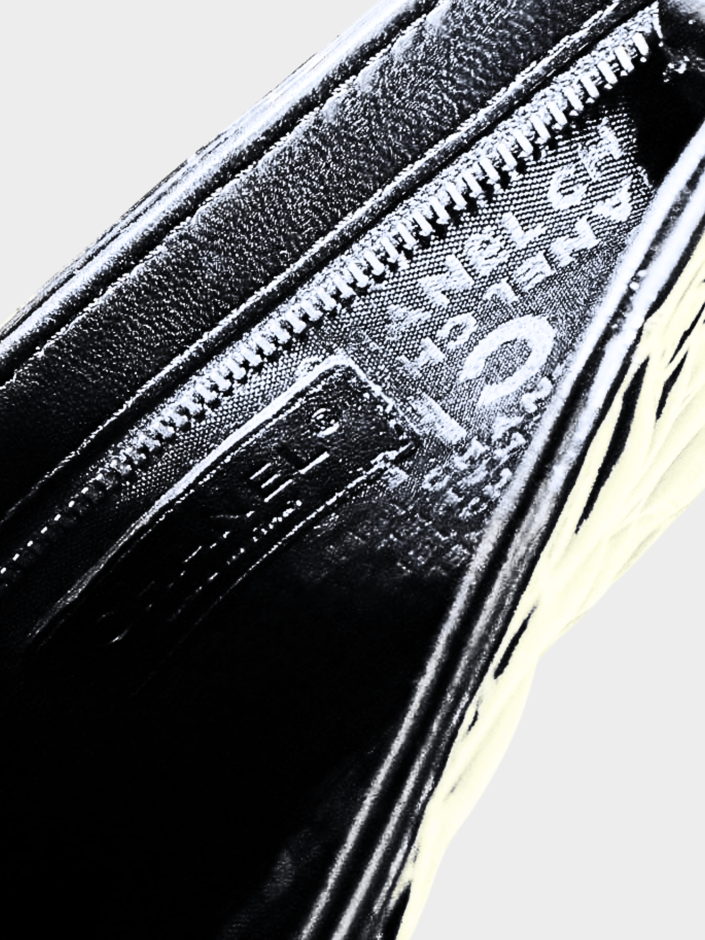 Chanel 2000s Black Camellia Embossed Patent Leather Mini Pochette Bag