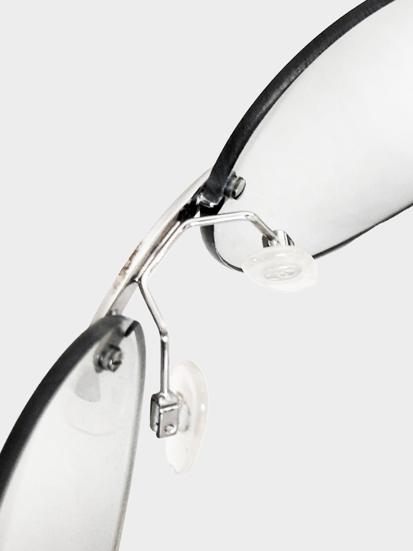 Chanel 2000s Grey Translucent Rimless Sunglasses