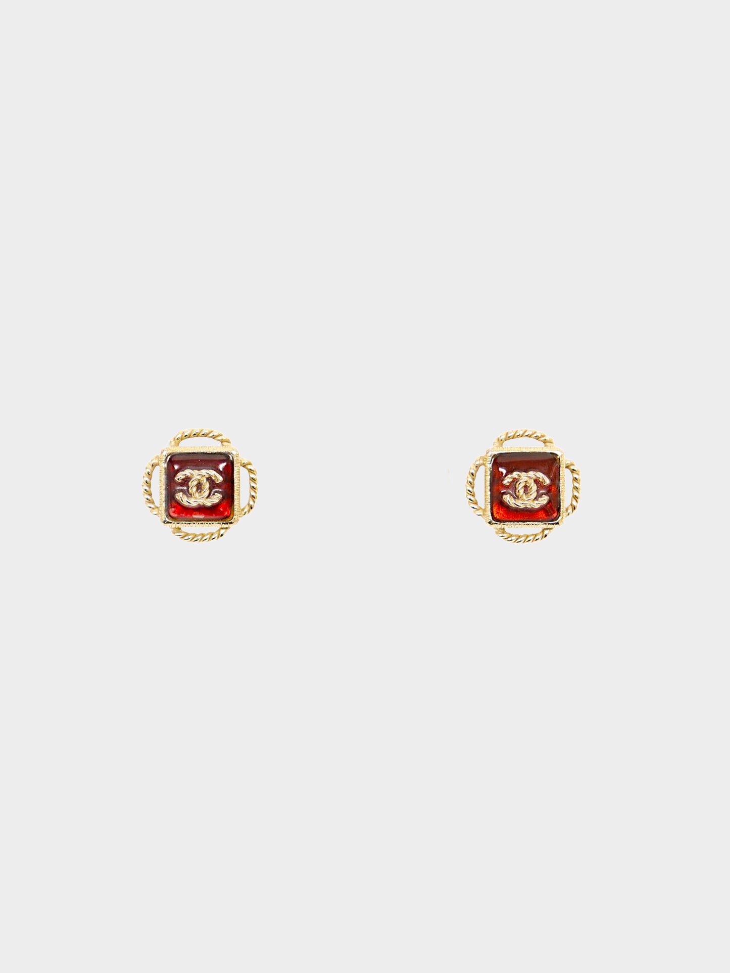 Chanel AW 2019 Gold Twisted CC Earrings with Red Cabochons