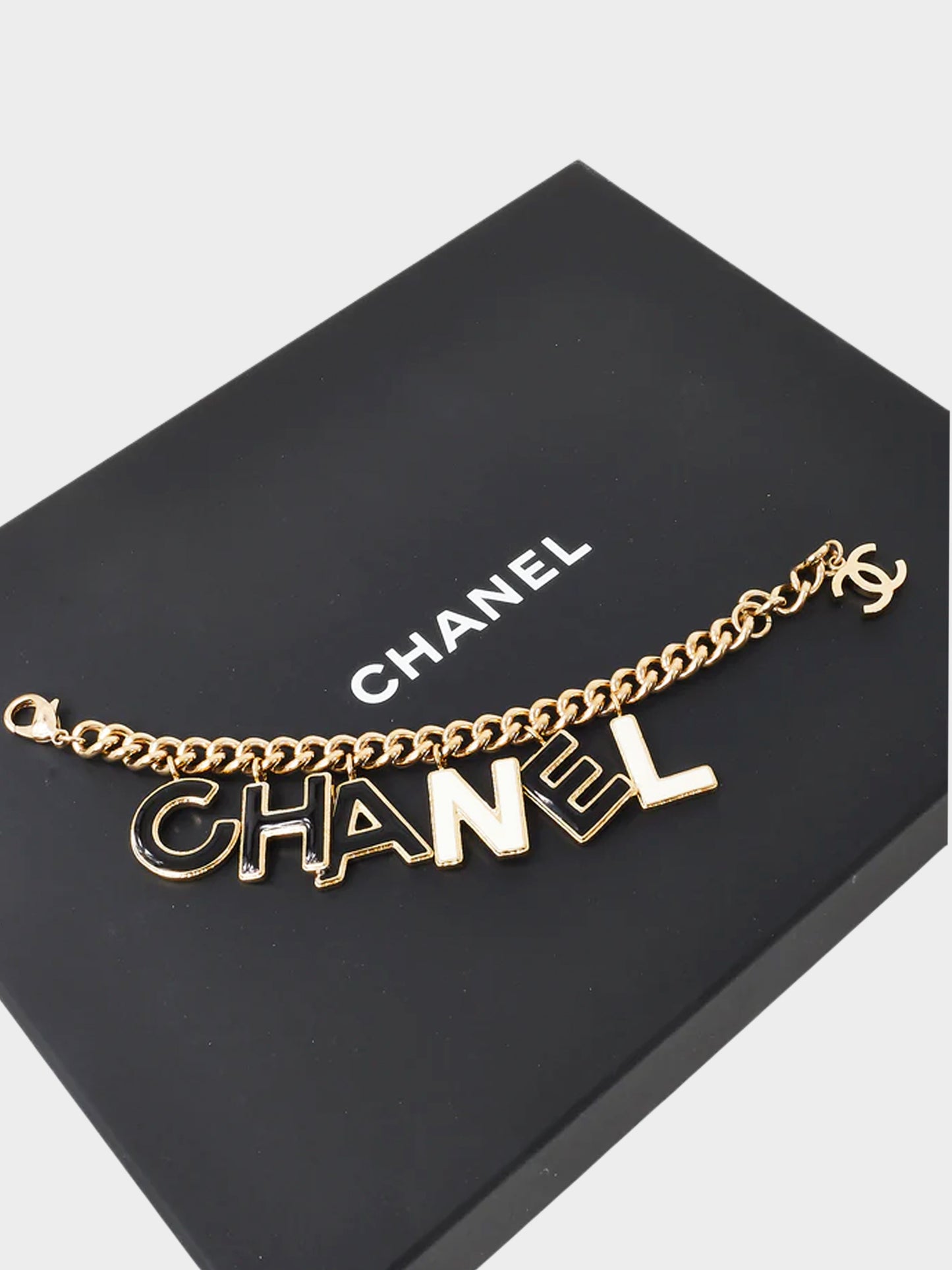 Chanel 2020s White and Black Enamel Logo Lettering Charms Chain Bracelet