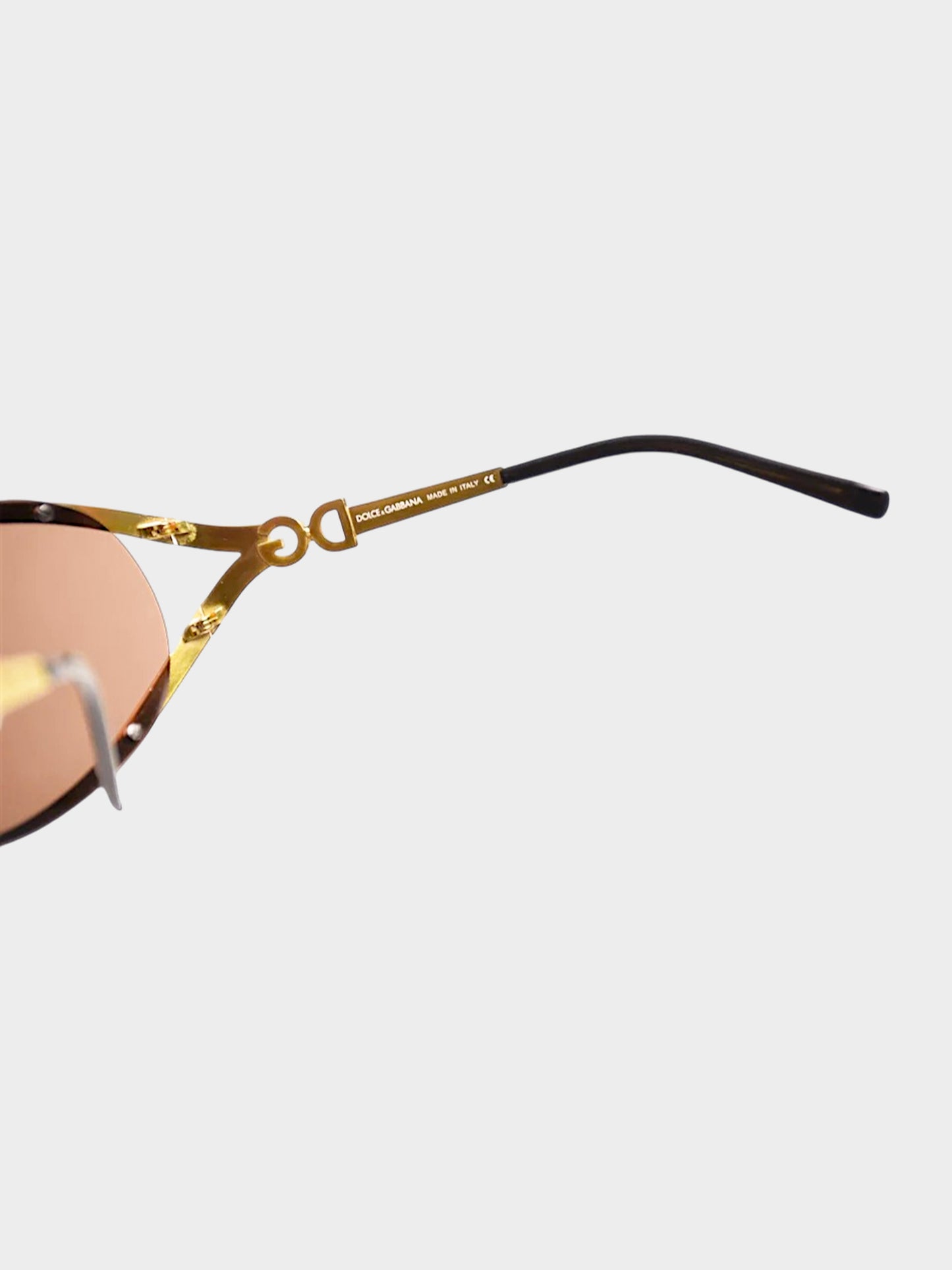 Dolce and Gabbana 1990s Gold Metal Frame Oval Sunglasses