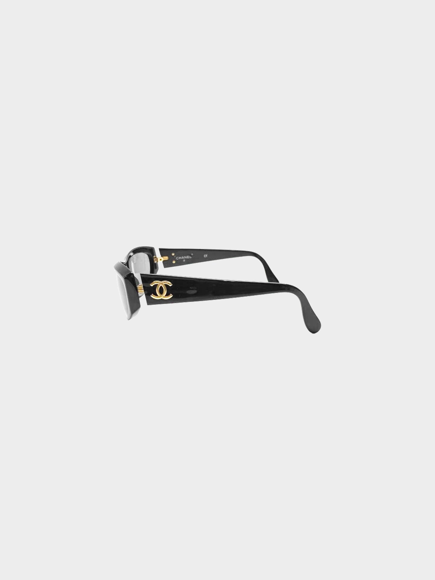 Chanel 2000s Black and Gold Acetate CC Oval Sunglasses