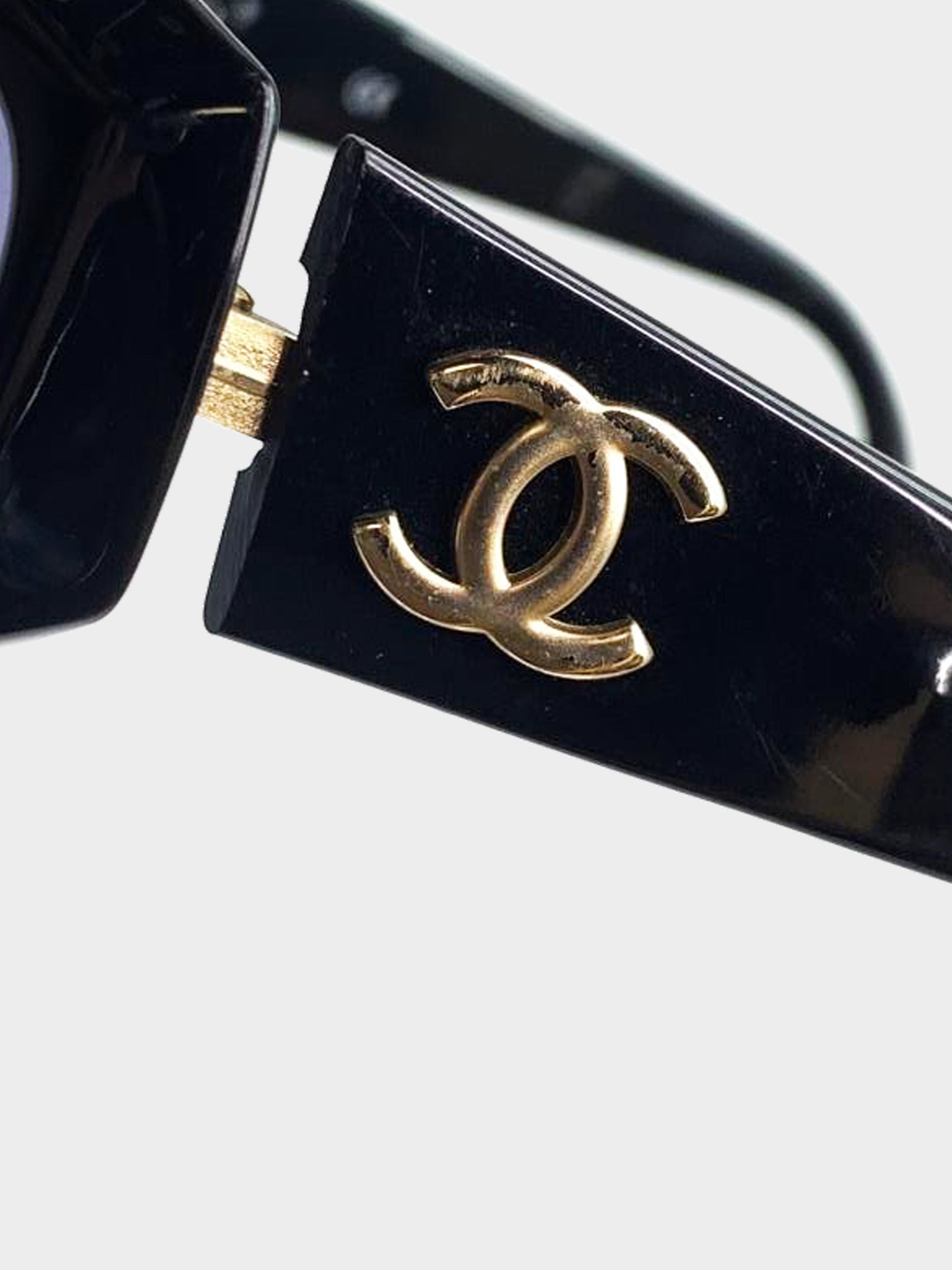 Chanel 2000s Black and Gold Acetate CC Oval Sunglasses