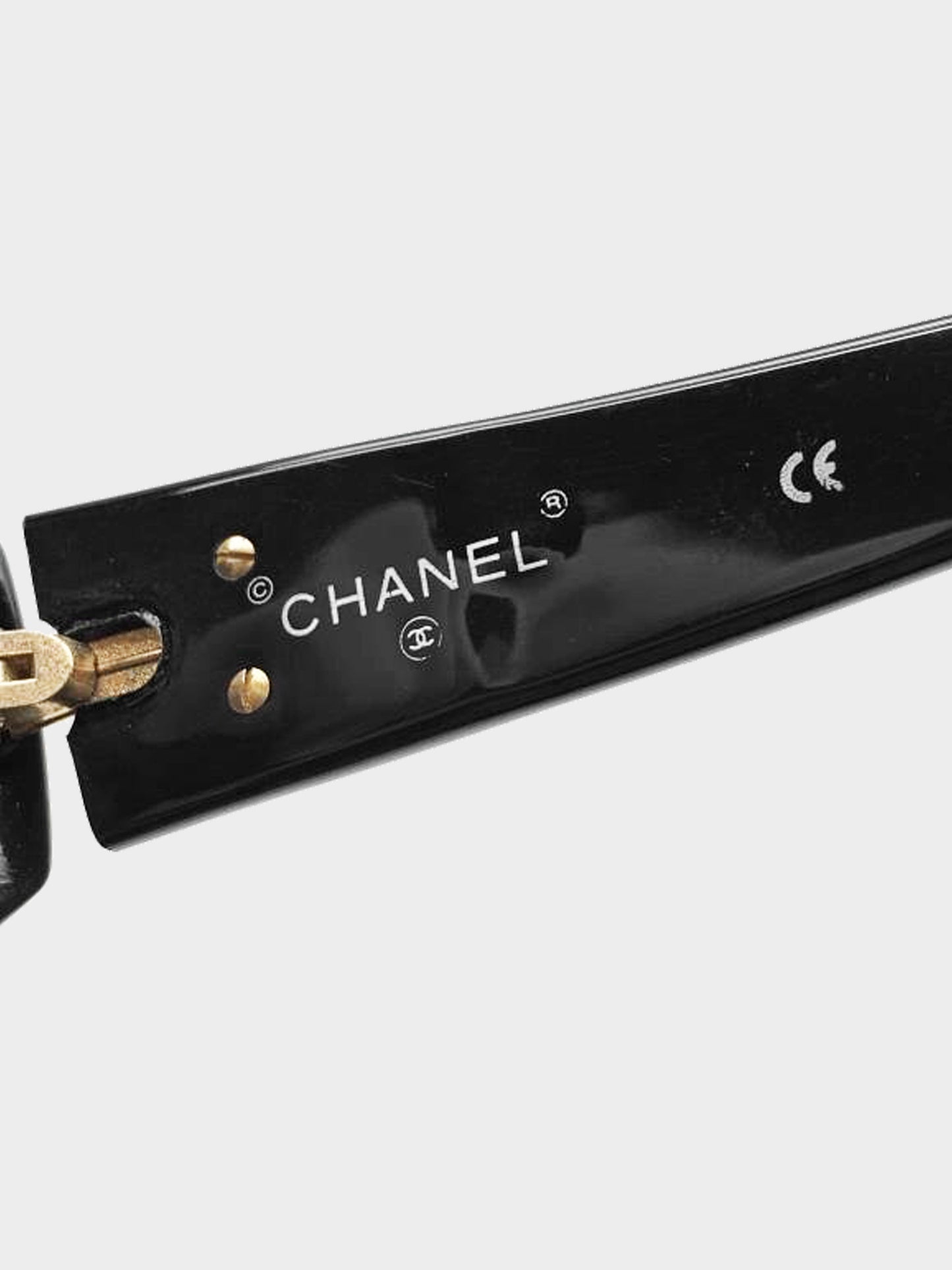 Chanel 2000s Black and Gold Acetate CC Oval Sunglasses