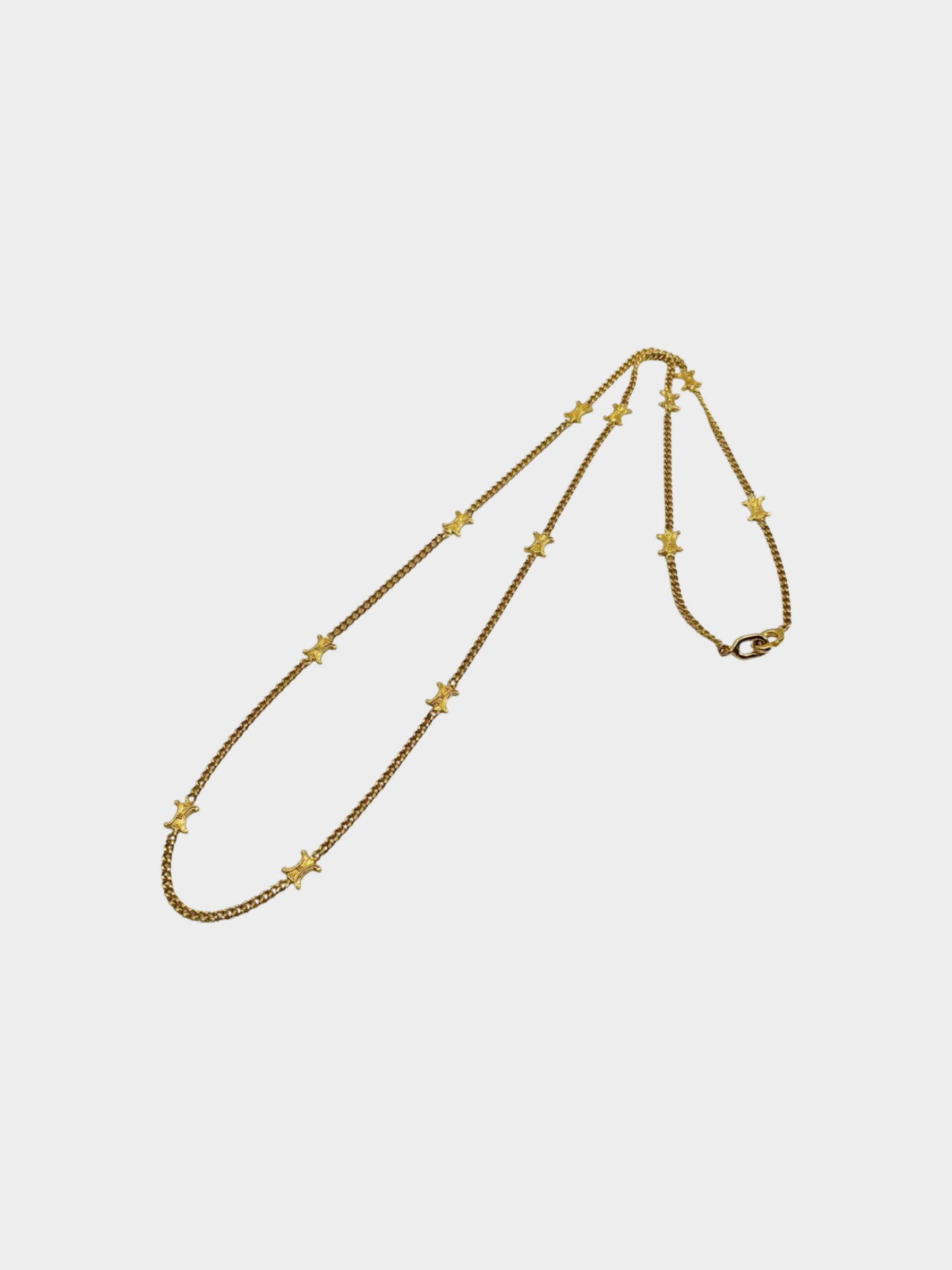 Celine 1990s Gold Long Triomphe Motif Necklace