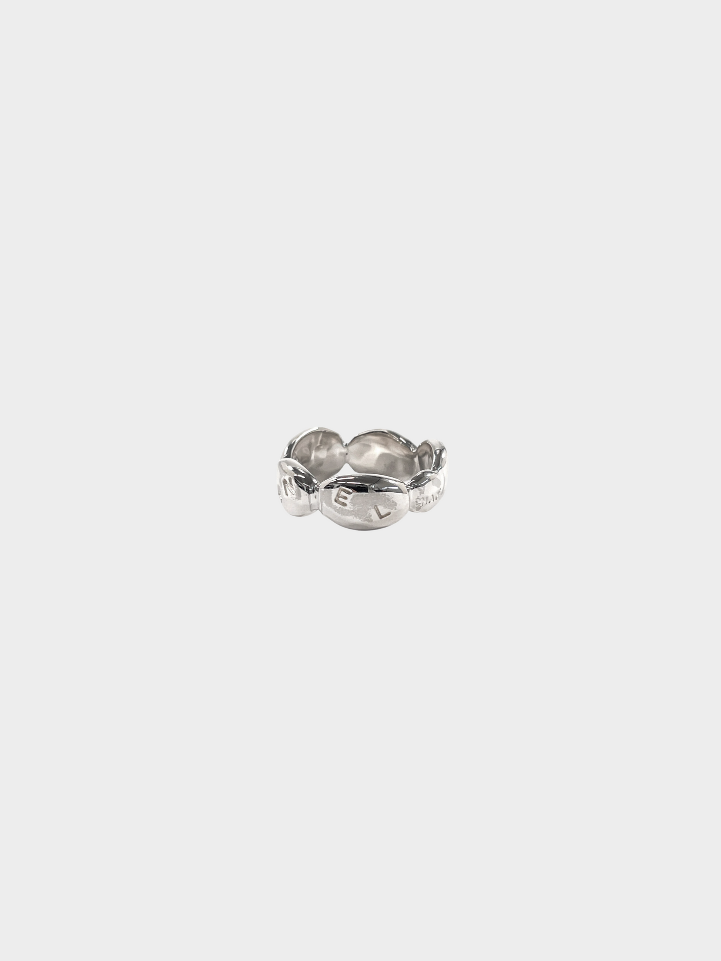 Chanel 1990s Silver Camellia Radis Logo Ring