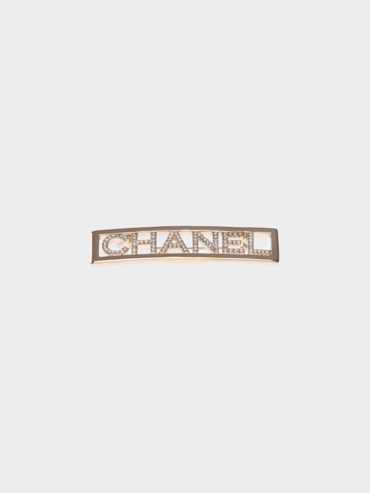 Chanel SS 2023 Gold Metal "CHANEL" Rhinestone Brooch