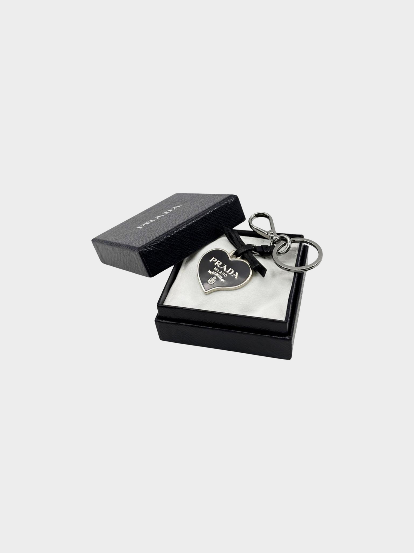 Prada 2000s Black Heart Shaped Logo Plaque with Silver Hardware Keychain