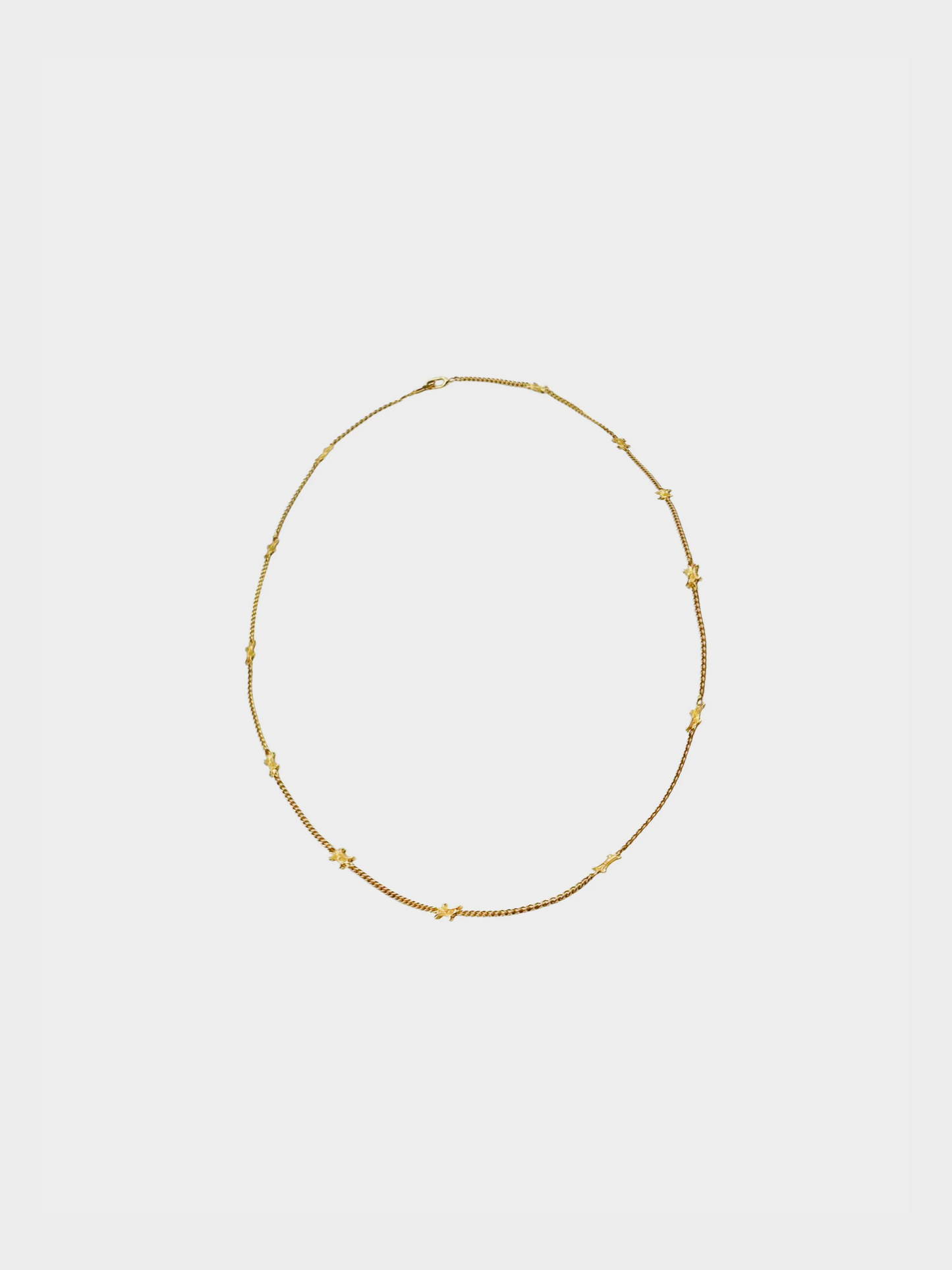 Celine 1990s Gold Long Triomphe Motif Necklace
