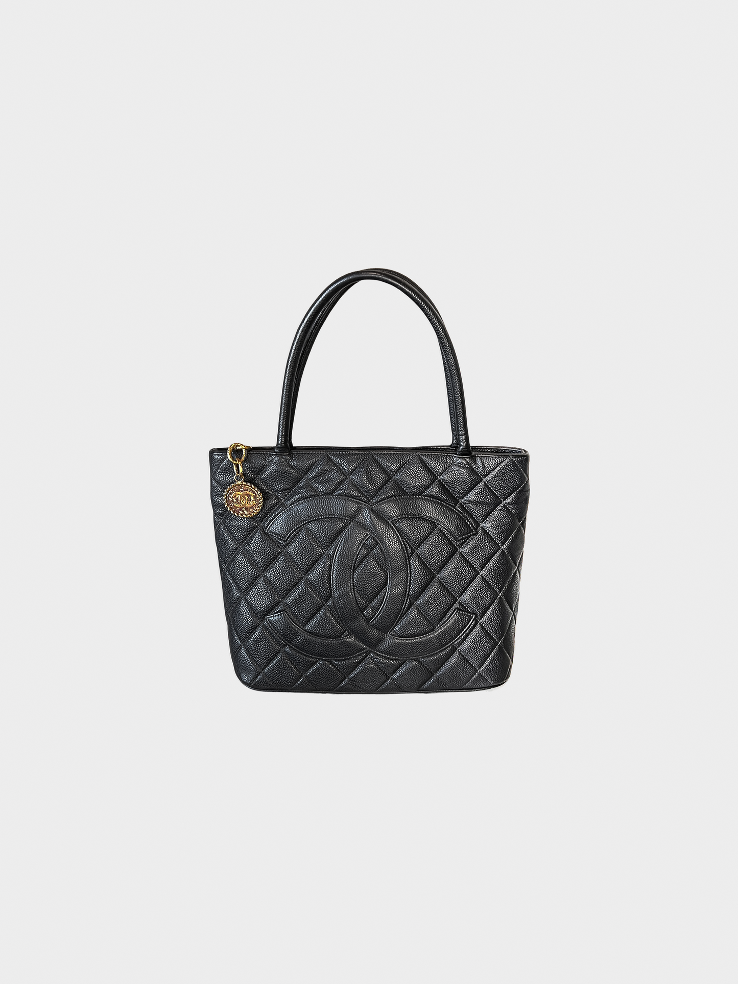 Chanel 2000s Black Caviar Skin Reissue Tote Bag